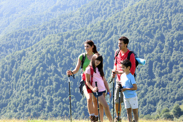 Wall Mural - Family on a trekking day in the mountains