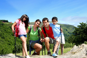 Wall Mural - Portrait of family on a trekking day in the moutain