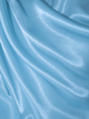 Draped blue silk background