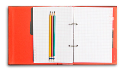 red notebook and pencil isolated with clipping path