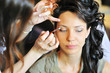 © paultarasenko - Young beautiful bride applying wedding make-up by make-up artist