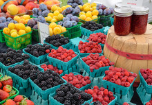 Berries And Plums At Farmers Market