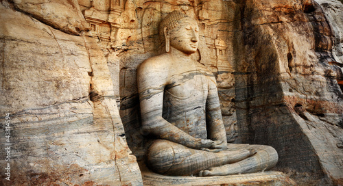 Naklejka ścienna Unique monolith Buddha statue in Polonnaruwa temple -Sri lanka