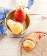 Fresh pears on a wooden table