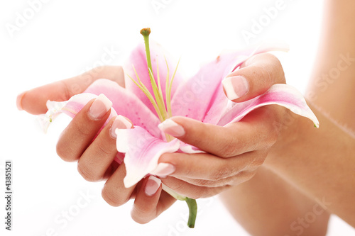 Naklejka - mata magnetyczna na lodówkę Beautiful woman hands and lily flower