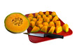 Cantaloupe Pieces and Half Fruit on a Cutting Board