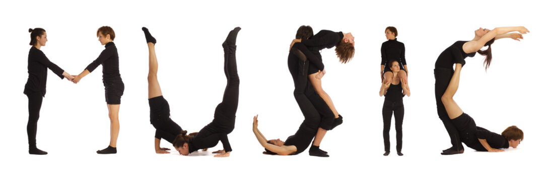 Black dressed people forming MUSIC word over white