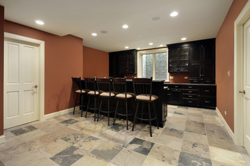 Wall Mural - Bar in basement with dark wood cabinetry