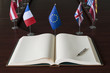 Open spread book, fountain pen, EU (European Union) (before brexit) flags