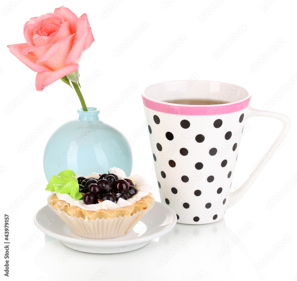 sweet cake with cup of tea isolated on white