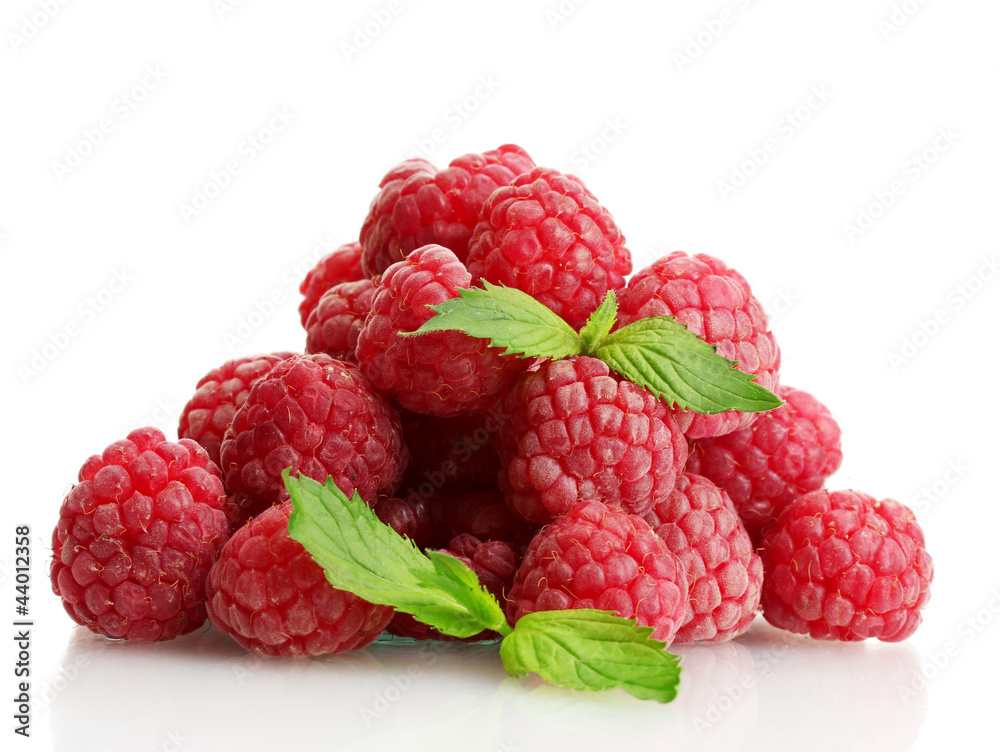 ripe raspberries with mint  isolated on white