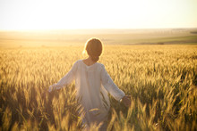 Woman In A Wheat Field