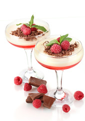 Wall Mural - fruit jelly in glasses with chocolate and raspberries isolated