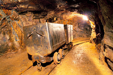 Wall Mural - Cart in gold mine - underground