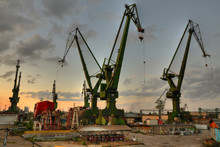 Gdansk Shipyard Cranes At Summer Evening
