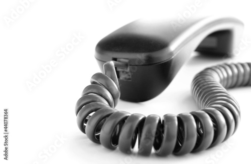 Fotografija phone and cable on a white background