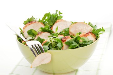 Canvas Print - Corn salad with chicken in green bowl.