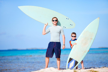 Poster - Father and son with surfboards