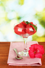 Watermelon ice cream in a glass goblet