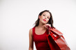 © ache1978 - Beautiful brunette girl holding shopping bags