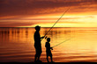 Fisherman silhouettes at sunrise