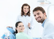 © Karramba Production - Dentist, his assistant and the patient