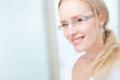 © listercz - Closeup portrait of a intelligent young woman wearing glasses