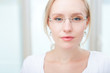 © listercz - Closeup portrait of a intelligent young woman wearing glasses