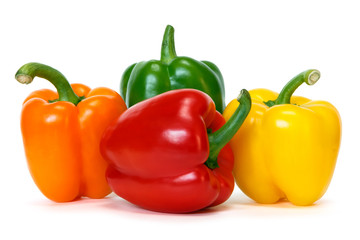 Wall Mural - colored peppers over white background