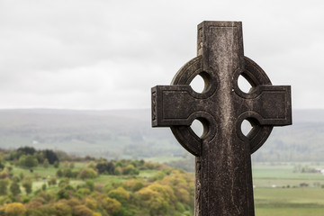 Grave stone on a graveyard