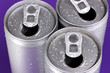 © Africa Studio - aluminum cans with water drops on purple background