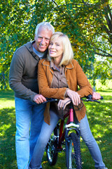 Canvas Print - Happy senior couple cyclist.