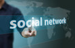 © Warakorn - Business hand touch social network