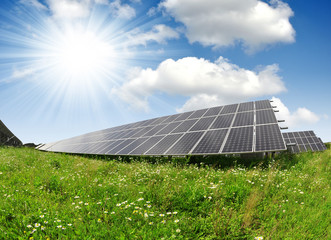Wall Mural - solar energy panels against sunny sky