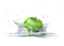 Green Apple Splashing Into Water. Close Up Side View, With Depth