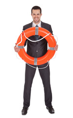 Young businessman with life buoy