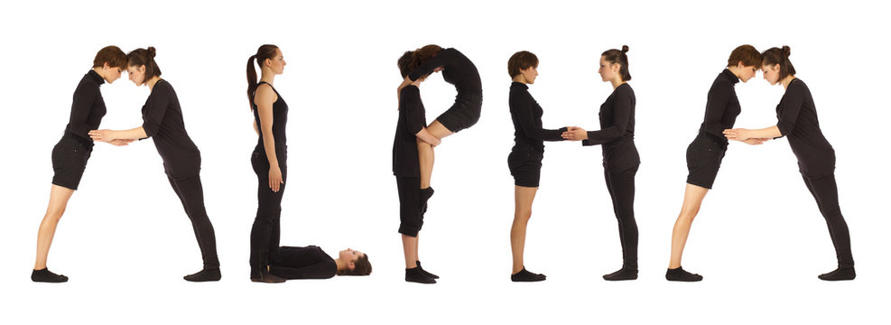 Black dressed people forming ALPHA word over white 