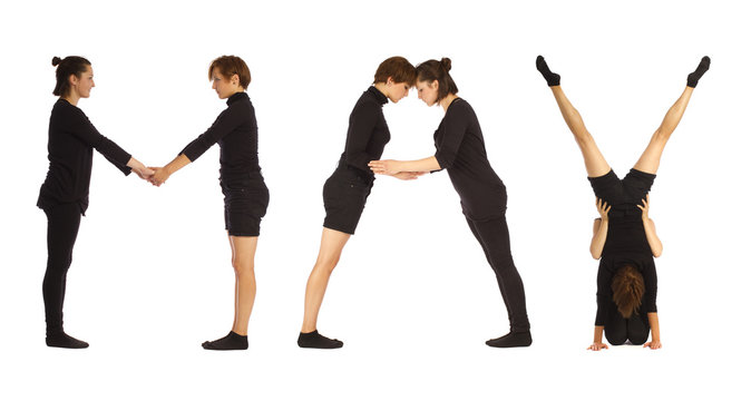 Black dressed people forming MAY word over white 
