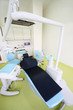 © Pavel Losevsky - Empty dental clinic. Chair for patient and drill for dentist