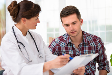 doctor with male patient