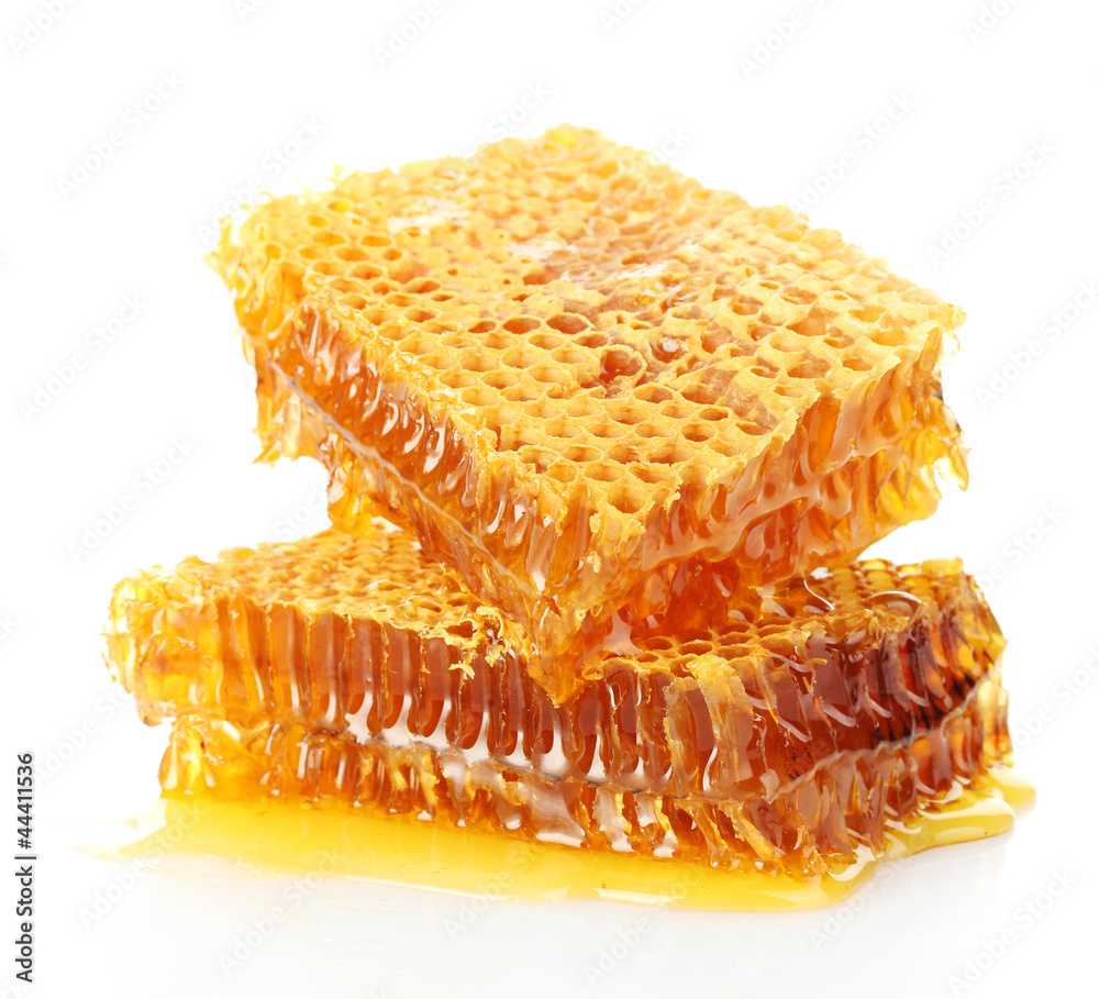 sweet honeycombs with honey, isolated on white