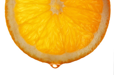 Slice of orange with drop, isolated on white