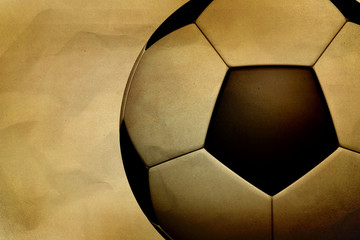 Vintage soccer ball on paper grunge background