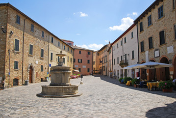 Wall Mural - San-Leo village main square with the fountain.