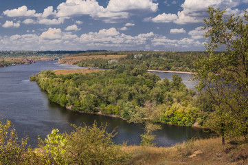 Naklejka na meble Summer landscape with river and cloudy sky