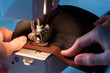 Seamstress Sewing On Velcro Hook-And-Loop Fastener