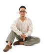 © WONG SZE FEI - Asian man sitting on floor