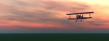 Biplan By Sunset