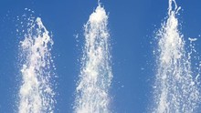 Three Top Fountain Water Against Blue Sky