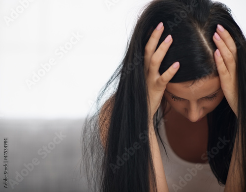 Fototapeta na wymiar Young woman in stress